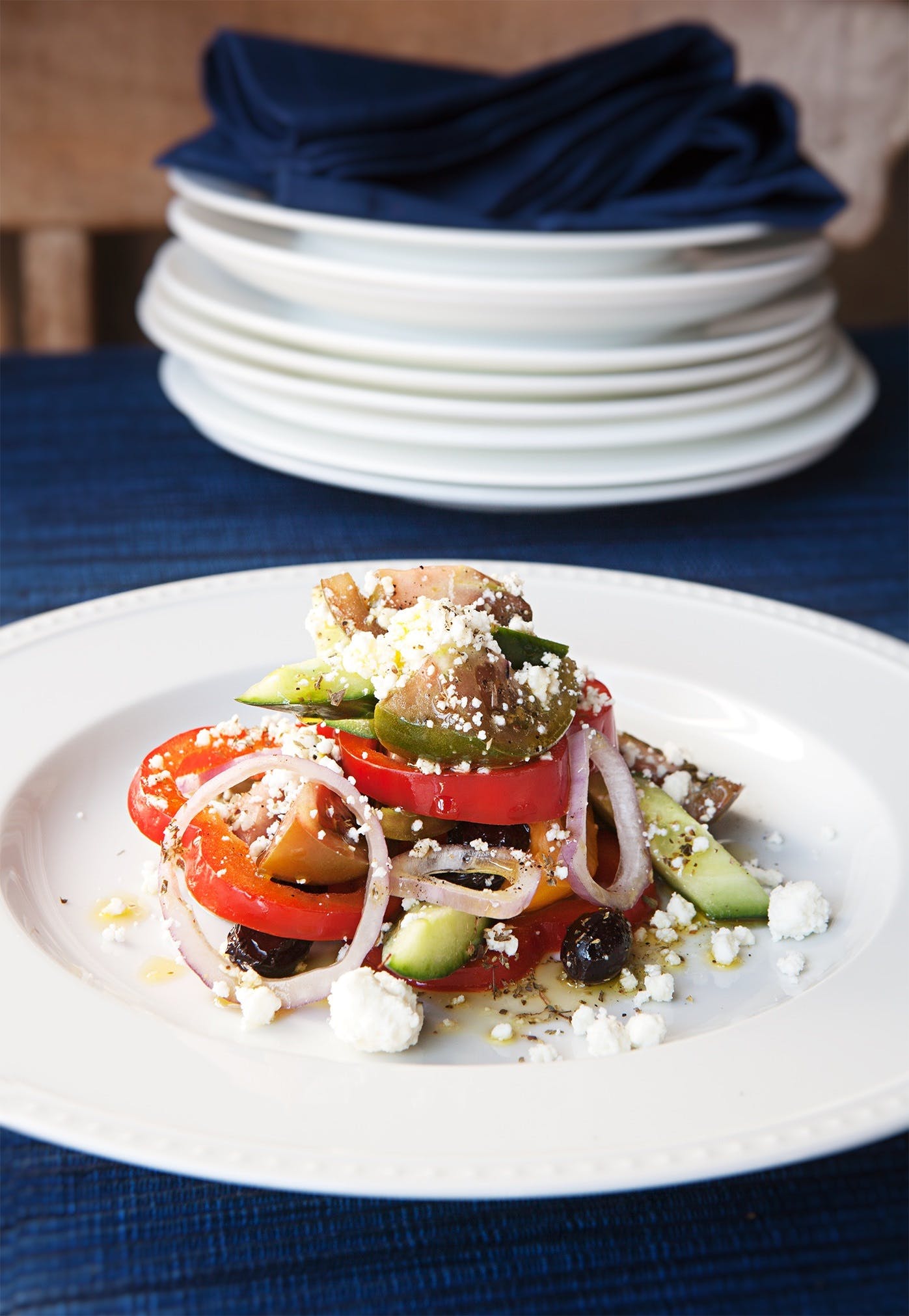 a white plate topped with different types of food on a table